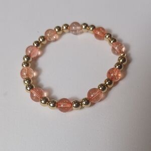 Elegant Gold and Pink Beaded Bracelet